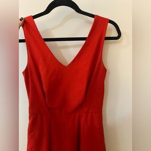 Red romper with an open back